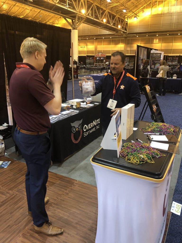 OSI Sales Manager Kevin Snedecor and Sales Representative Elliot Rowe at the OSI booth at Clean Gulf 2019.